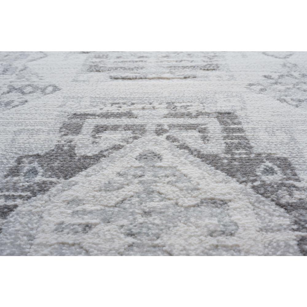 Essentials Whispers Ivory, Gray, and Beige Polypropylene Area Rug, 7'9" x 10'6"