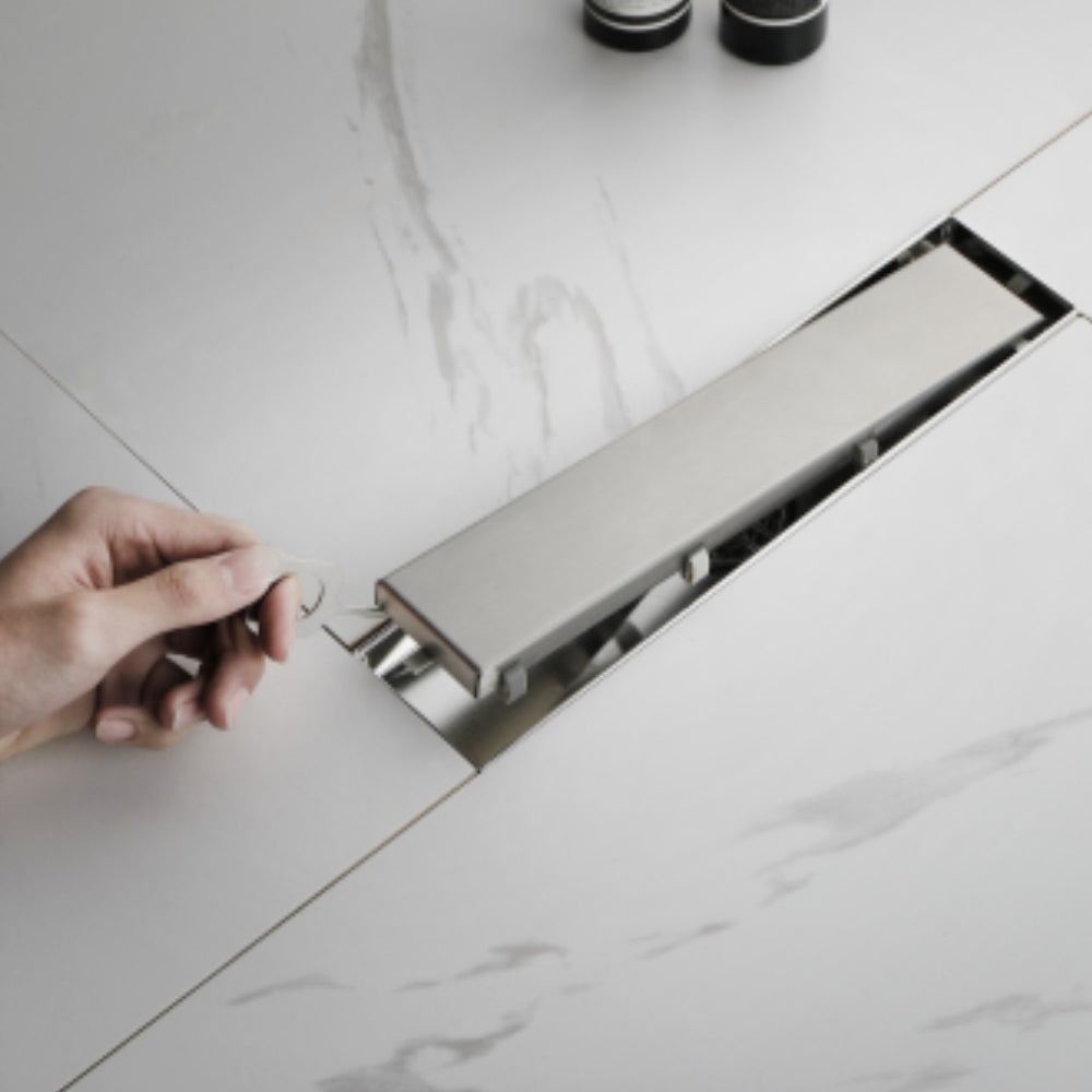Sleek 12-Inch Brushed Nickel Linear Shower Drain with Removable Quadrato Pattern Grate